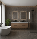 Modern bathroom with wooden vanity, freestanding bathtub, and glass shower enclosure.