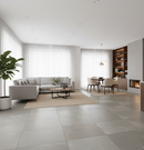 Modern living room with gray sectional sofa, coffee table, and a view into a dining area.