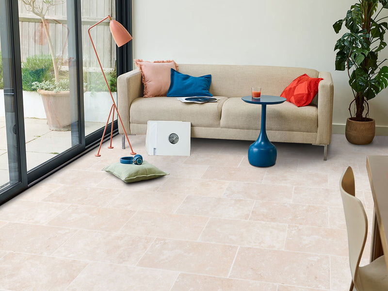 Miletos ivory travertine 12x24 honed filled multiple installed living room floor wide view