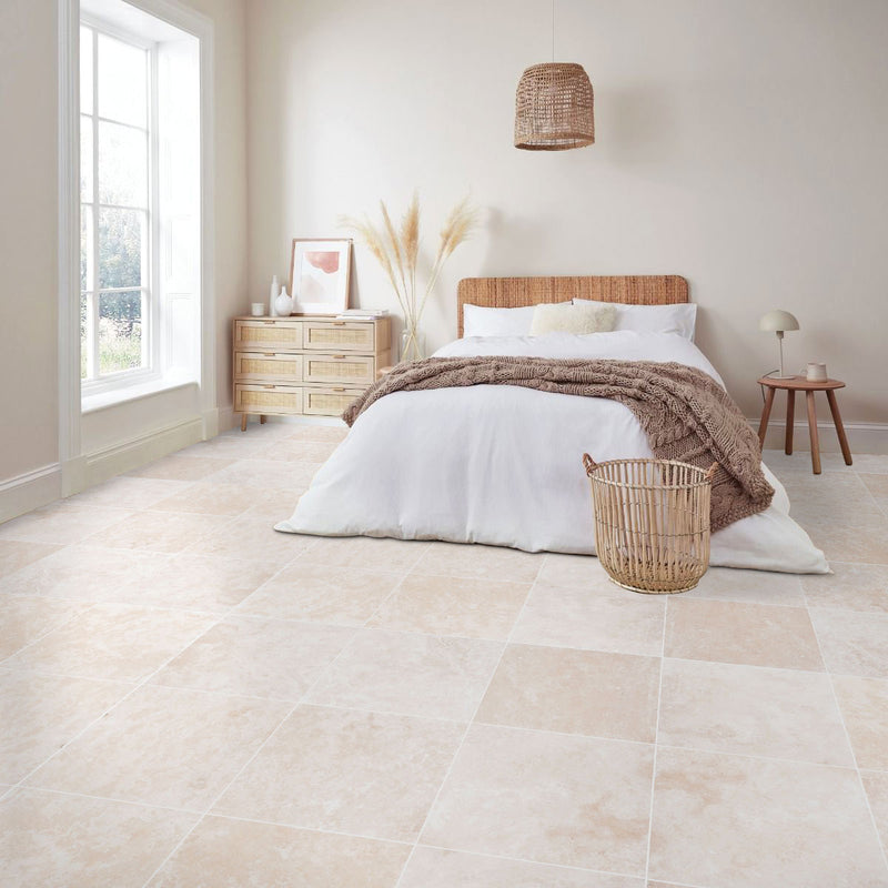 Miletos ivory travertine 24x24 honed filled installed bright sunny bedroom floor
