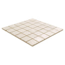A square mosaic tile sheet featuring small, square, light beige textured tiles with thin, warm gold grout lines, shown on a solid white background.