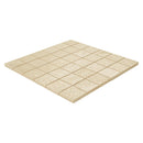 A square mosaic tile sheet made of small beige stone tiles with a textured, speckled finish, shown at an angle on a white background. 