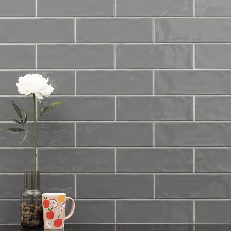 Urbano Graphite Bullnose 4"x12" Glossy Ceramic Wall Tile - MSI Collection product shot glass and jar view