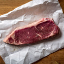 New York Strips and Beef Patties with Choice of Seasoning | 12 oz Steaks and 1/3 lb Patties | Shipping Included | Nebraska Star Beef