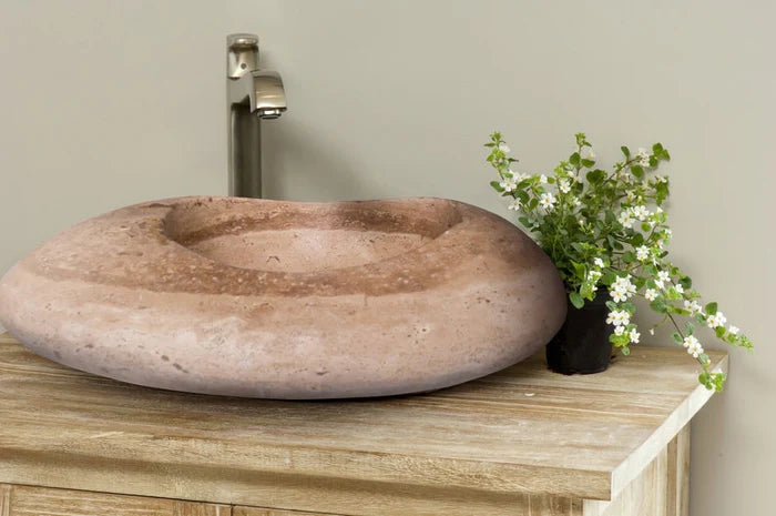 Noce Travertine Natural Stone Kayak Design Above Vanity Bathroom Vessel Sink (W)16" (L)23" (H)6" bathroom view  above vanity next to flower chrome faucet