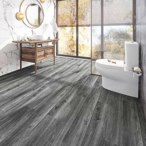 SPC Vinyl Rigid Core 7" Width 60" RL, 6mm Thick, 1.5mm IXPE  Nocturne Blade Silva Floors - Mazzia Collection Product shoot Wash Room view