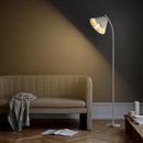 Minimalist floor lamp with a pleated lampshade