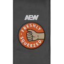 Silver Sofa with AEW Orange Cassidy Freshly Squeezed Logo