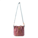 Myra Emberlace Embossed Leather Bucket Bag in Berry Rouge
