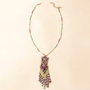 Myra Sky and Coral in necklace in Turquoise