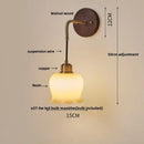 DecorBites™ Adjustable LED Wall Light Fixture with Ceramic Wood Base for Home Decor
