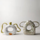DecorBites™ Abstract Handle Ceramic Vase for Floral Arrangements and Home Decoration