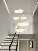 DecorBites™ LED Pebble Pendant Light: Stylish White Chandelier for Living Room, Bedroom, and Restaurant Décor.