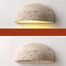 Textured travertine wall light – porch warm yellow sconce