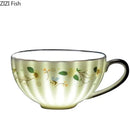 DecorBites™ Elegant Gold Flower Cup & Saucer Set - Delicate Porcelain Tea Coffee Mug