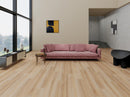 Modern living room with a pink sofa, wooden floor, and large windows. SL-09VH
