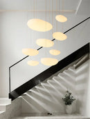 DecorBites™ LED Pebble Pendant Light: Stylish White Chandelier for Living Room, Bedroom, and Restaurant Décor.