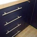 Lew's Round Bar Cabinet Knobs and Handles in Brushed Brass