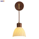 DecorBites™ Adjustable LED Wall Light Fixture with Ceramic Wood Base for Home Decor