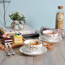 DecorBites™ Elegant Gold Flower Cup & Saucer Set - Delicate Porcelain Tea Coffee Mug