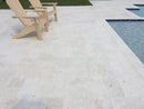 Shell Stone White Fossil Limestone Tumbled Pavers - Full Truckload French pattern installed around pool