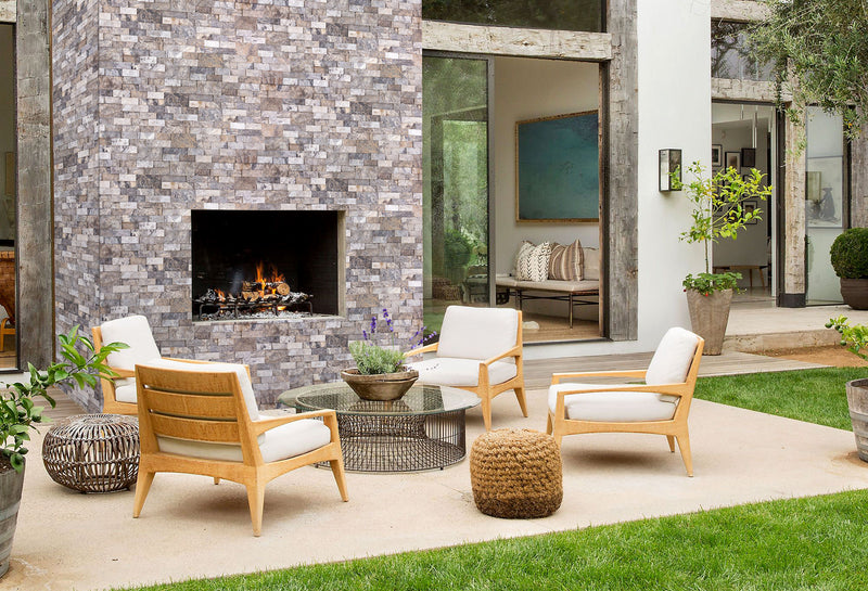 Silver Ledger 3D Panel 6"x24" Natural Travertine Wall Tile - Full Truckload installed around outdoor fireplace modern white cushion outdoor furniture wide view