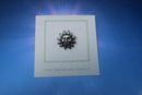 Sun Face Lapel Pin