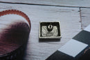 T.V. Talking Heads Lapel Pin