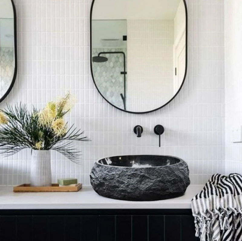 Toros Black Marble Above Vanity Rustic Bathroom Sink installed bathroom a towel above vanity and ceramic white vase and nice yellow flowers