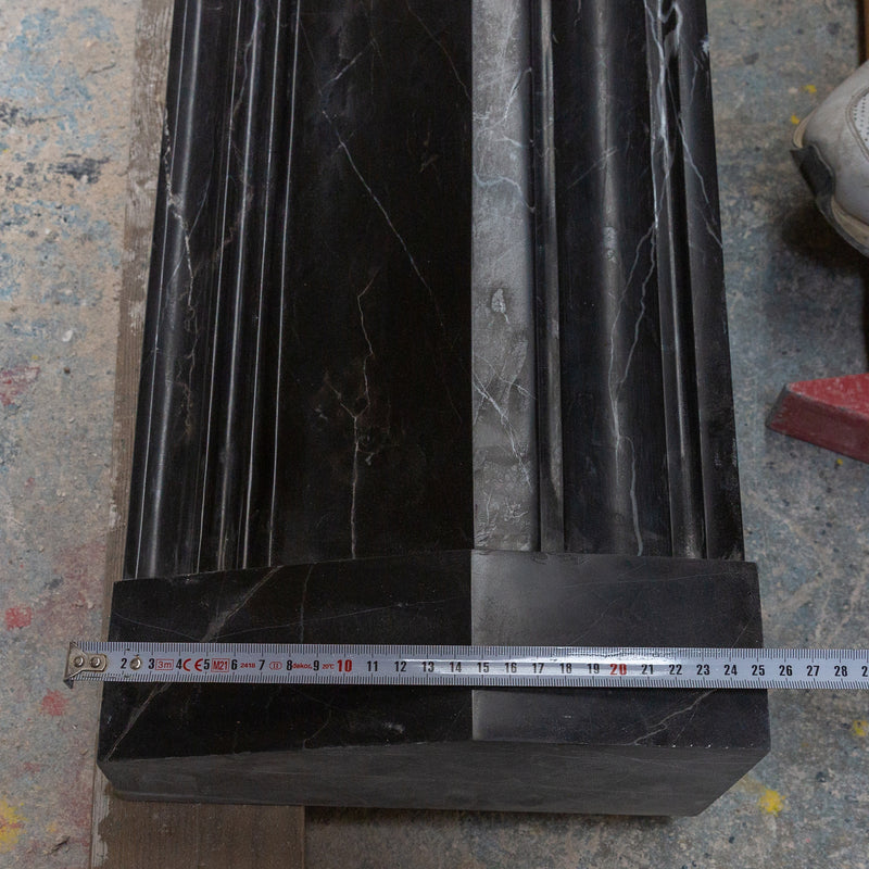 Toros black fireplace mantel polished 49x69 leg sizes