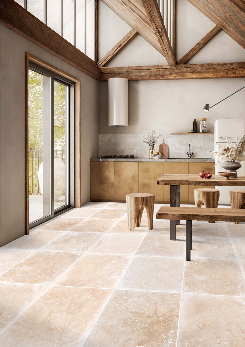 Tuscany beige travertine floor wall tile 24x24 installed bright kitchen floor wide view