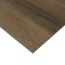 Close-up of a brown vinyl floor tile on a white background