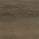 Close-up of a brown wooden surface with visible grain.