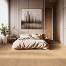 Modern bedroom with a large bed, wall art, and wooden flooring.
