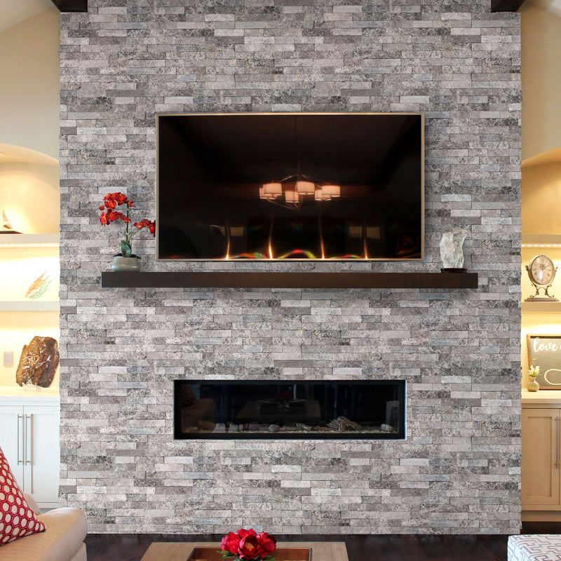 Ventana Gray Ledger 3D Panel 6x24 Multi-surface Natural Marble Wall Tile installed around fireplace TV square