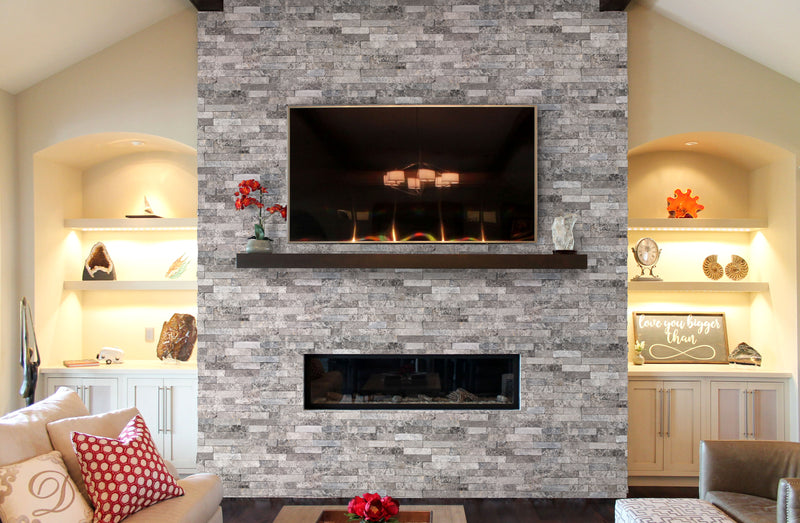 Ventana Gray Ledger 3D Panel 6x24 Multi-surface Natural Marble Wall Tile installed around fireplace TV