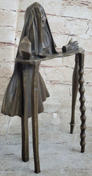 Disembodied Head Floating Over Table - Scary Surrealist Bronze Sculpture by Dali