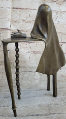 Disembodied Head Floating Over Table - Scary Surrealist Bronze Sculpture by Dali