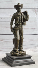 Country Western Cowboy in Chaps Carrying Horse Saddle Bronze Statue Sculpture Figure 12" x 4"