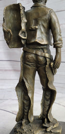 Country Western Cowboy in Chaps Carrying Horse Saddle Bronze Statue Sculpture Figure 12" x 4"