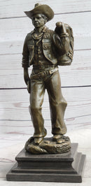 Country Western Cowboy in Chaps Carrying Horse Saddle Bronze Statue Sculpture Figure 12" x 4"