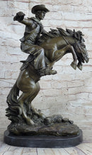 Bronco Buster inspired Country Western Art Bronze Sculpture Featuring Cowboy on Horseback