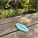 Wanderlust Motel Style Keychain in Green with Gold Hardware