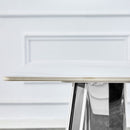 Table and chair set.63'x31.5x30' Luxurious Snow Mountain Patterned Sintered Stone Table with Silver Metal Butterfly Legs.Paried With 6 Dark Gray High-quality PU Chairs With Arched Metal Legs.