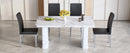 Table and chair set.64.5x35.4 Inch Stylish White Marble Textured Dining Table.Paried With 4 Black PU dining chairs, Silver Metal Legs.Simple and versatile.High Elasticity Sponge Filling.