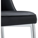 6 modern dining chairs, sleek PU backrest, and silver metal legs bring a comfortable home experience to the kitchen, bedroom, and office.Black PU Chairs with Simple Line Designs On The Backrest.
