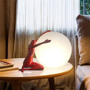 Abstract black & red ball holding character resins lamp living room