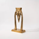 Abstract golden masked figure sculpture living room decor