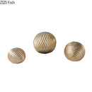 Abstract golden wave ball sculpture living room ribbed metal decor