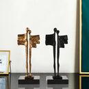 Abstract iron cast couple statue gold & black living room decor